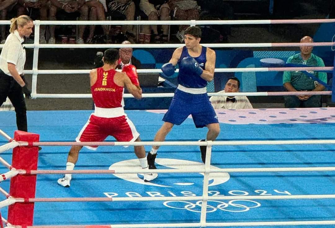 -	En disputada pelea, el pugilista mazatleco pone alma, corazón y cuerpo, pero cayó derrotado ante el uzbeko Asadkhuja Muydinkhujaev, ganando así la cuarta medalla de plata para Mexico en la disciplina de boxeo, con la valiosa guía del entrenador Radamés Hernández, en su esquina